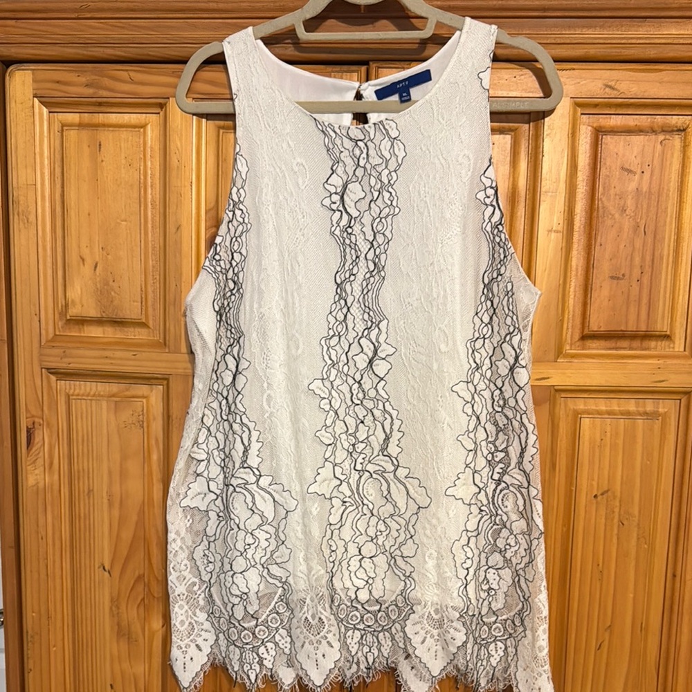 Beautiful off white and black sleeveless tunic